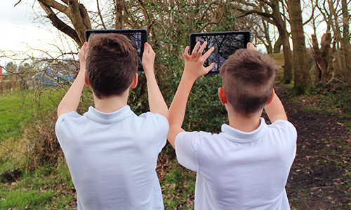 Student and teacher in school lab