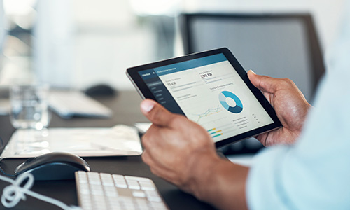 Office user upgrading software on tablet