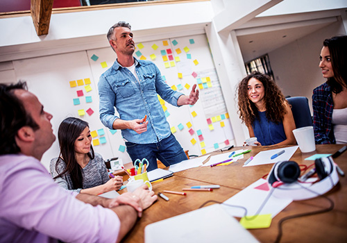 Trainer delivering training to teachers