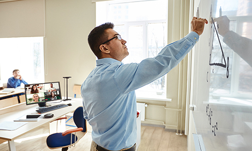 A male presenting via a video conference call