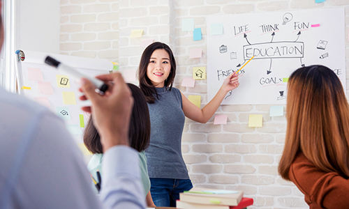 Female teacher discussing 1:1 options and benifits