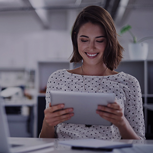 Teacher using tablet with fast connectivity in the classroom